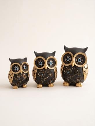 Handcrafted resin owl showpiece set in black and gold finish